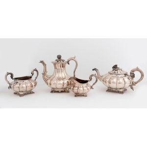 A Sheffield Plate tea set, 19th century the coffee pot 21 cm…