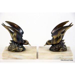 A pair of Art Deco spelter swallow book ends, circa 1920s, the…