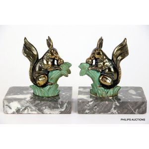 A pair of Art Deco spelter squirrel book ends, circa 1920s, a…