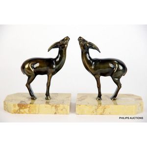A pair of spelter gazelle bookends, circa 1930, the matching…