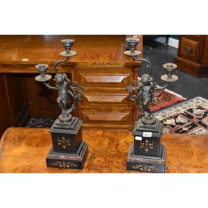 Pair of mantle garnitures, bronze cherub two branch candle…