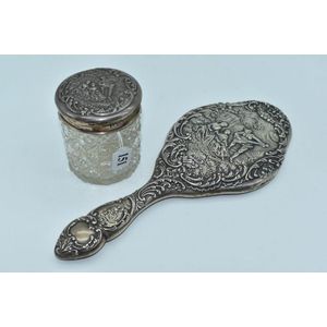Sterling silver embossed hand-held mirror decorated with…