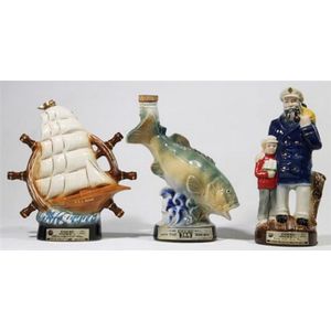 A 1973 Jim Beam trout fishing decanter, a 1980 USS Norfolk…