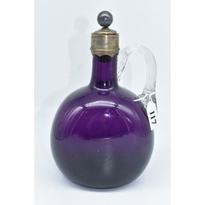 Amethyst glass claret jug with a clear celery handle and…