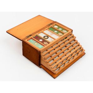 A polished wood fold-out specimen box, 19th century, fitted…