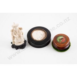 19th century ebonised circular snuff box glazed top inset with…