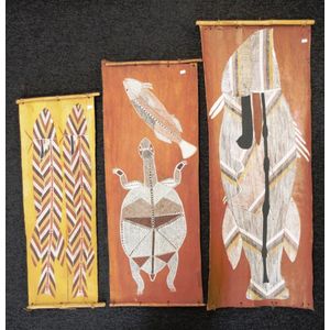 Three Australian Indigenous art works on bark including: two…