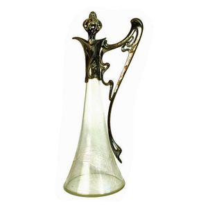 A WMF Art Nouveau claret jug, with silver plated collar, open…