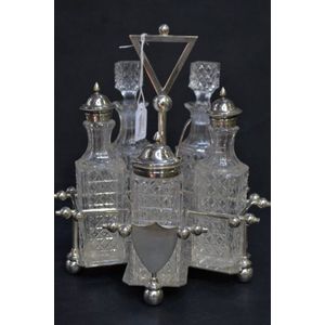 Art Deco five bottle on silver plate cruet set, fine condition