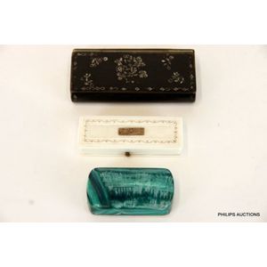 Two Georgian papier mache snuff boxes and a miniature gold…