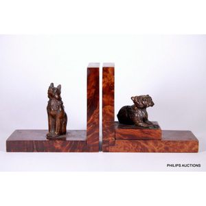 A pair of Art Deco carved dog bookends, circa 1930s, the Black…
