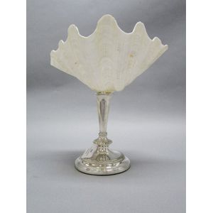 Shell centre piece on a silver on copper stand. Crested with…