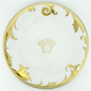 Medusa pattern service plates set of 9 by Gianni Versace on artnet