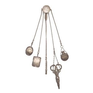 A Victorian chatelaine, hung with a sterling silver scent…