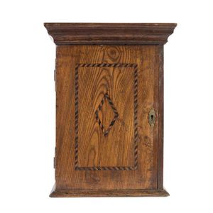 A Georgian oak miniature cabinet with barber pole inlaid door,…