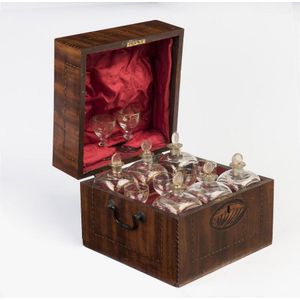 A George III marquetry inlay mahogany tantalus, containing six…