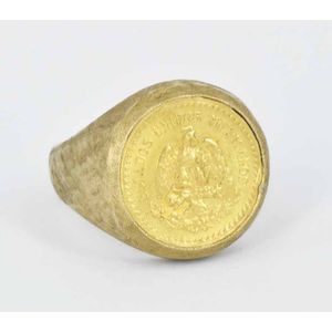 A gents ring, set with a Mexican gold coin, in 9ct yellow gold…