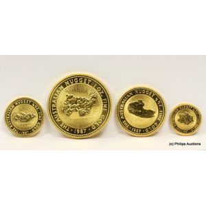 An Australian 1987 boxed nugget coin set. 24ct yellow gold,…