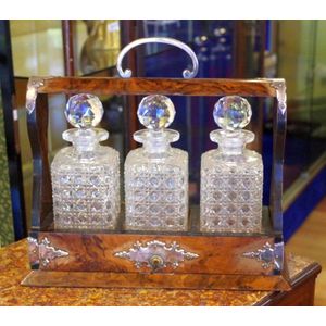Antique walnut 3 decanter tantalus, with 3 cut glass decanters,…