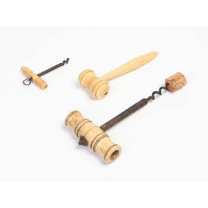 Two whalebone handled corkscrews and a whalebone and whale…