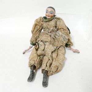 A French antique jointed Pierrot doll, painted plaster head…
