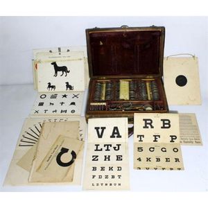 A timber cased Optometrist's Kit, c.1931, comprising a full set…