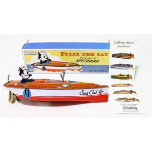 A Felix the cat wind-up tin Speedboat, in original box, from…