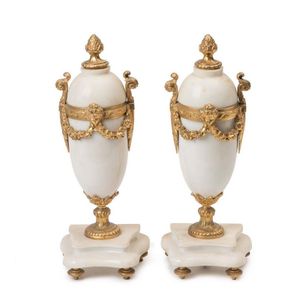 A pair of Louis XV style gilt metal mounted marble urns, 36 cm…