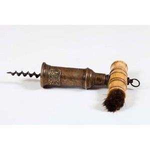 A Victorian patented brass corkscrew with whalebone handle and…