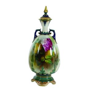 A Royal Worcester lidded urn vase, Hadley's shape, green mark,…