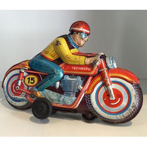 A tin motorcycle racer friction toy (no. 15, colour Variant) by…