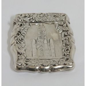 A Victorian silver castle top card case, depicting a high…
