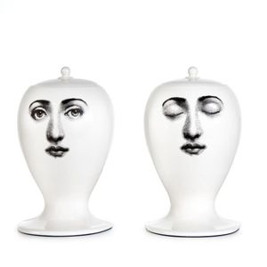 A pair of bookends by Piero Fornasetti, sculptural, lidded form,…