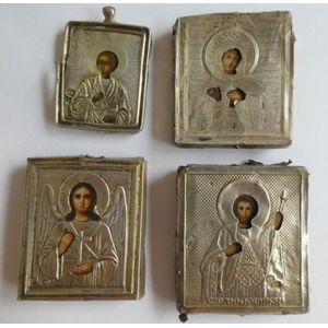 Four antique Russian silver miniature icons one depicting Mary…