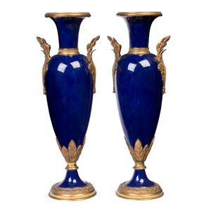 A pair of Royal blue glazed porcelain gilt bronze mounted…