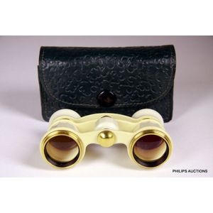 A pair of vintage opera glasses, 20th century, of faceted…