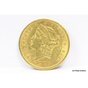 A 1906 $20 American Liberty head gold coin. 21.6ct, 900 fine…