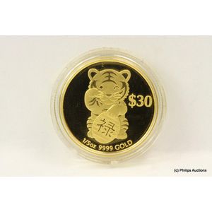An Australian gold year of the tiger coin, boxed with…