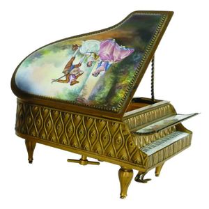 A brass and enamel jewellery box, in the form of a grand piano,…