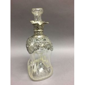Antique glug glug decanter, with etched floral decoration and…