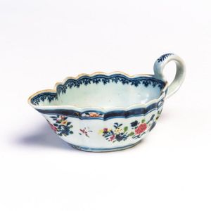 A Chinese porcelain sauce boat, 18th century, decorated in…