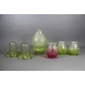 Six various sized green and pink lamp shades, 29 cm high and…