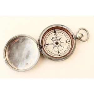 American Usanite pocket compass, c.1918, of bun form, opening…