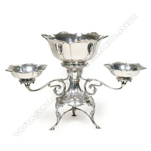 An Edwardian Scottish silver table centrepiece, a central…