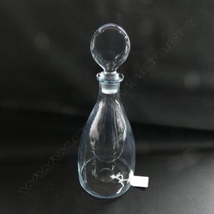 A Strombergshyttan glass decanter, mallet shape with occular…