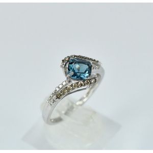 A blue topaz dress ring, the central square cushion cut topaz… - Rings ...