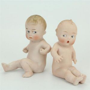 Gebruder Heubach all bisque baby piano dolls one with an angry…