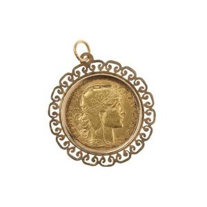 A 1913 French 20 Franc gold coin, in 14ct gold frame, wt. 8.2g.