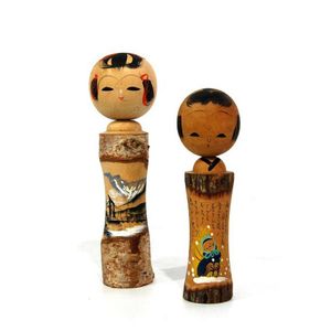 Two Japanese Kokeshi dolls, the variation in pattern & design…