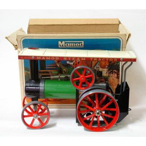 A 'Mamod Steam Tractor', in original box, black, green, red and…